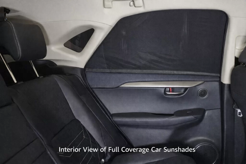 Qualizzi® full-coverage mesh car window sunshade installed on a rear side window, shown from inside the vehicle