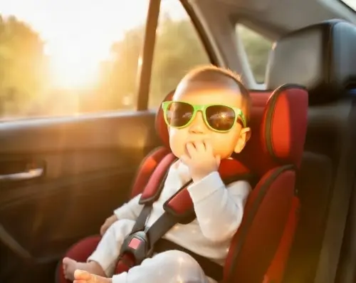 Sun on baby's face without sunshades